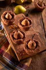 Muffins with pears and agave syrupe