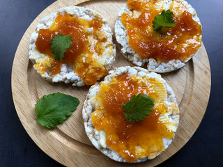 Healthy rice waffles, crispbread or puffed rice snack with apricot jam. Healthy sweet vegetarian snack, dessert or breakfast.
