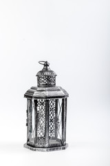Beautiful vintage metal lantern on a white background
