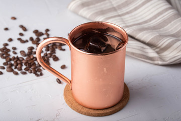 cold brewed coffee in copper mug