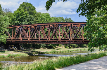 Iron Bridge Over River Against Sky