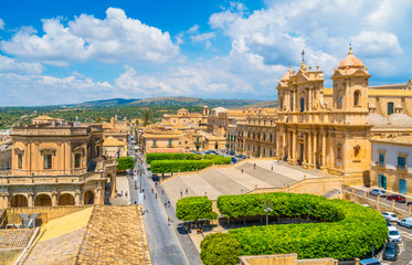 Naklejka premium Panoramic view in Noto, with the Cathedral and the Palazzo Ducezio. Province of Siracusa, Sicily, Italy. 