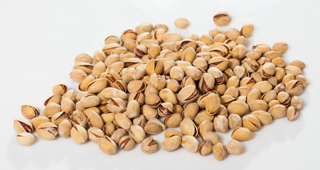 Pistachios on white background