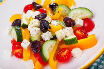 Fototapeta na wymiar Appetizing Greek salad