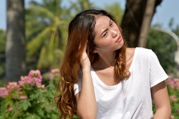 Naklejka premium Worrisome Youthful Minority Woman