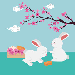 rabbits couple with chinese tree branch and flowers