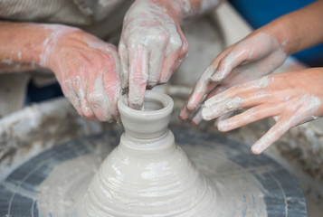 people use their hands during a pottery class