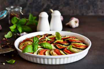 Ratatouille - a traditional vegetable dish of French cuisine. Ratatouille dish of eggplant,...