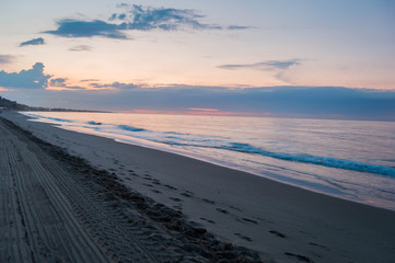 Landscape photo of the beach of Port Ginesta in Barcelona.