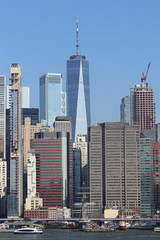Fototapeta na wymiar Manhattan skyline including One World Trade Center, also known as the Freedom Tower. More than 800 languages are spoken in New York City IV