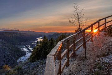 Fototapeta premium Sunset sky clouds above canyon of Krka river