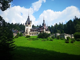 Peles Castle Romanian: Castelul Peles is a Neo-Renaissance castle in the Carpathian Mountains, near...