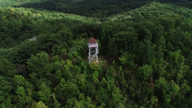 Pinnacle Knob Fire Tower in woodland environment, aerial
