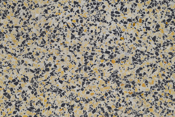 Marble tiles interspersed with granite. The texture of paving slabs