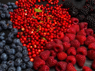 super antioxidants. superfood. mix of fresh berries, rich with resveratrol, vitamins, raw food ingredients. nutrition background, nutrient-rich foods are good for your heart and brain