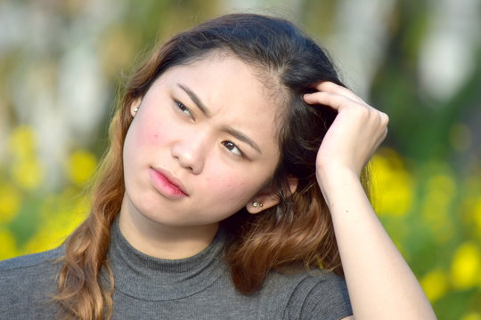 Young Female And Confusion