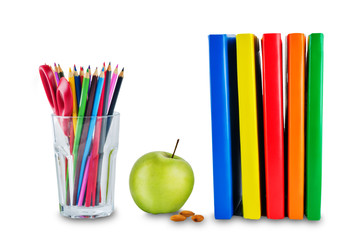 school lunch with a sandwich, fresh fruits and multicolored books on a white isolated background