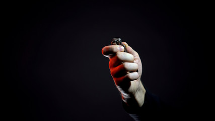 Male holding jackknife, robbery risk, tourist equipment for hiking and camping