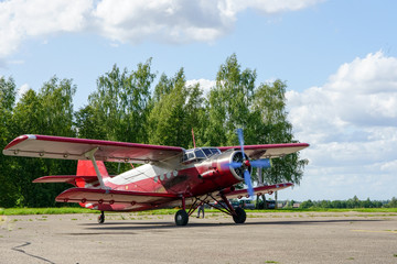 Fototapeta na wymiar historical single engine airplane Antonov AN2, starting the engine