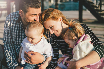 Happy family spending time together outdoors.