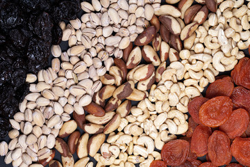 Diagonal pattern of different varieties of nuts and dried fruits
