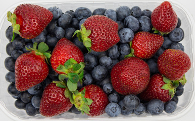 Fresh strawberries. Strawberry background. Macro texture. big, big strawberries. Fresh strawberry and blueberries. summer composition.