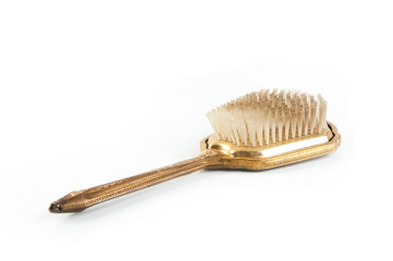 Antique hair brush on white