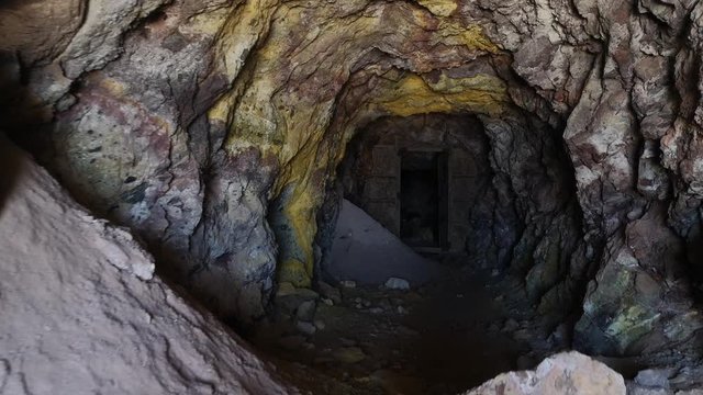 Point of view of walking into an old mine