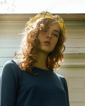 Portrait of young woman wearing beret