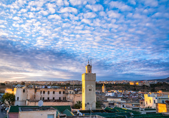 Naklejka premium Amazing view of the old Medina in Fez ( Fes El Bali ) , Morocco at sunset. The ancient city and the oldest capital of Morocco, unesco world heritage site. Artistic picture. Beauty world