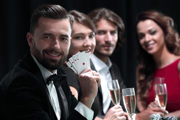 Handsome man playing in casino
