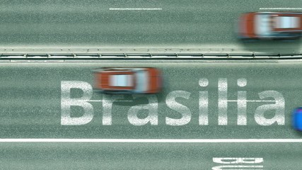 Top down view of the highway with revealing Brasilia text. Driving in Brazil intro clip