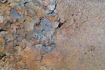 Flakes of rust on a sheet of rusty iron. Background of rust. Corrosion of metal