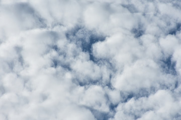 Mostly cloudy sky with patches of blue.