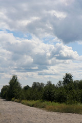 Fototapeta na wymiar rural road and blue sky
