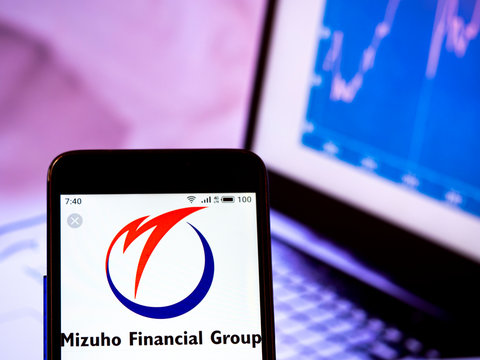 Kiev, Ukraine, July 2, 2019. In this photo illustration the Mizuho Financial Group, Inc. logo is seen displayed on a smartphone