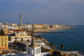 Naklejka premium Aerial view of the old city rooftops and Cathedral de Santa Cruz in the morning from tower Tavira in Cadiz, Andalusia(Andalucia), Spain