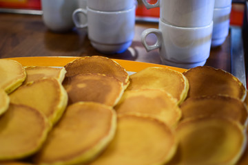 Pancakes on the dish. Traditional Norwegian pastries.