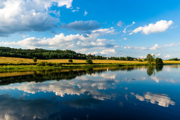 Lanscape with pond and cloudy sky, South Bohemia, Czech Republic