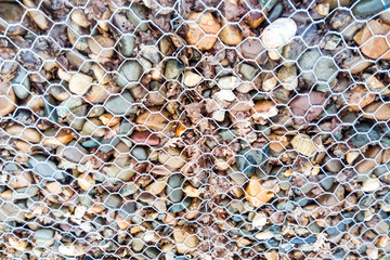 Retaining net on the slope. The net keeps the pebble from scattering