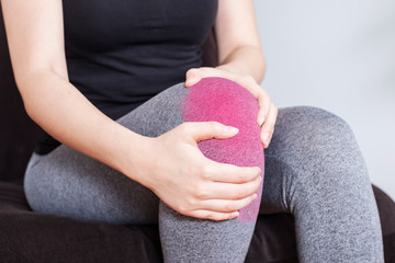 young woman have abdominal and joint pain