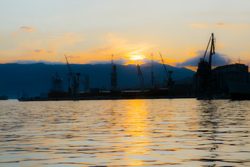 Naklejka premium Harbour of Rijeka in sunset in Croatia