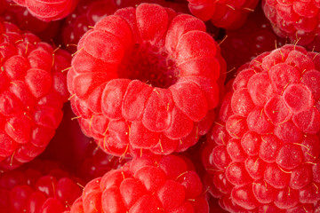 texture of ripe juicy raspberries, closeup, for design, vitamins, berries, fruits