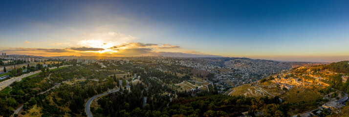 Aerial sunset view of Jerusalem  with the old city and the western parts, Silwan, Rehavia, Abu Tor and talpiyot © tamas