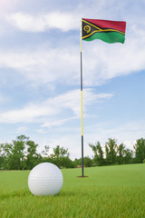 Obraz premium Vanuatu flag on golf course putting green with a ball near the hole
