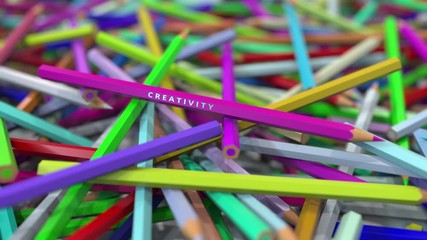 Pencil with CREATIVITY text emphasised on big pile of color pencils