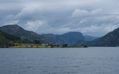 Fototapeta na wymiar Sunny Norwegian landscape. View of the route of the Lauvvik - Oanes ferry in Norway. July 2019