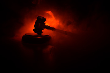 Document with judge on wooden table. Law theme. Selective focus