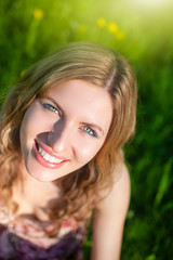 Closeup Portrait of Happy Smiling Caucasian Blond Woman.