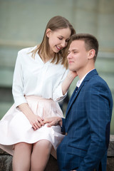 Happy Couple in Love Embracing Outdoors on street.
